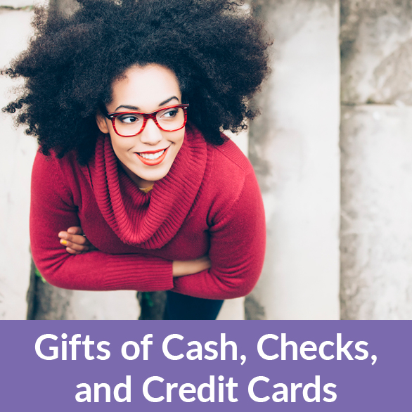 A woman smiling. Gifts of Cash, Check, and Credit Cards Rollover A woman smiling. Gifts of Cash, Check, and Credit Cards Rollover